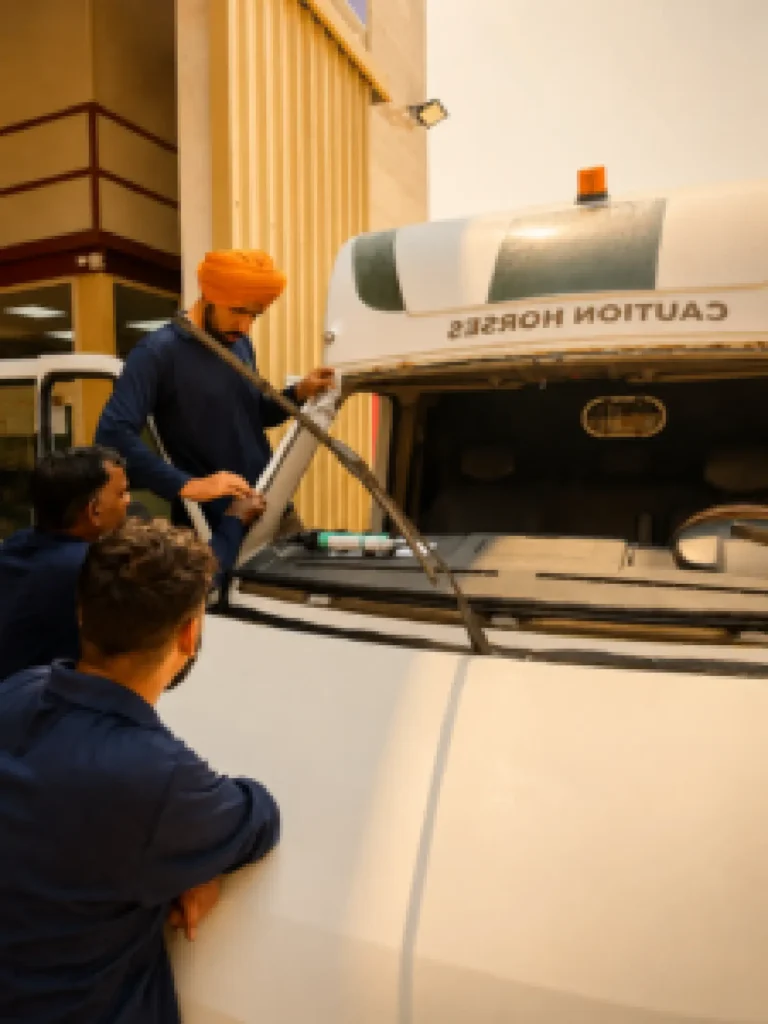 Auto glass technicians providing professional vehicle glass replacement in UAE